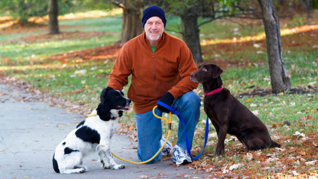 man-middle-age-dogs-woods-2col.jpg