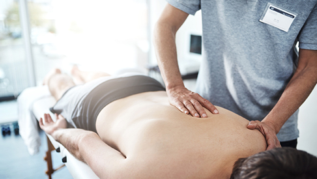 Patient receiving a back massage